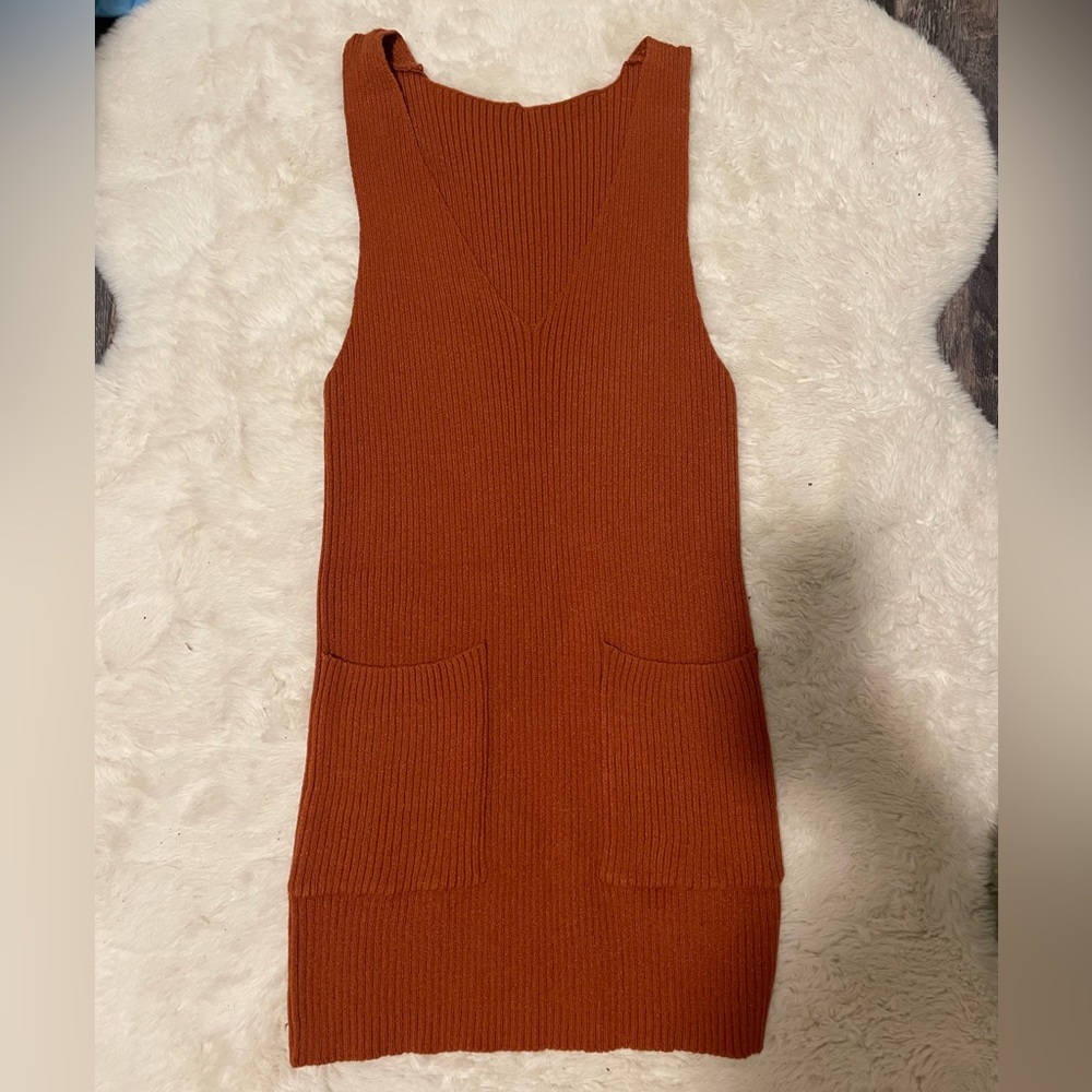 Orange Overall Dress. Never worn but does not have tags on it.
